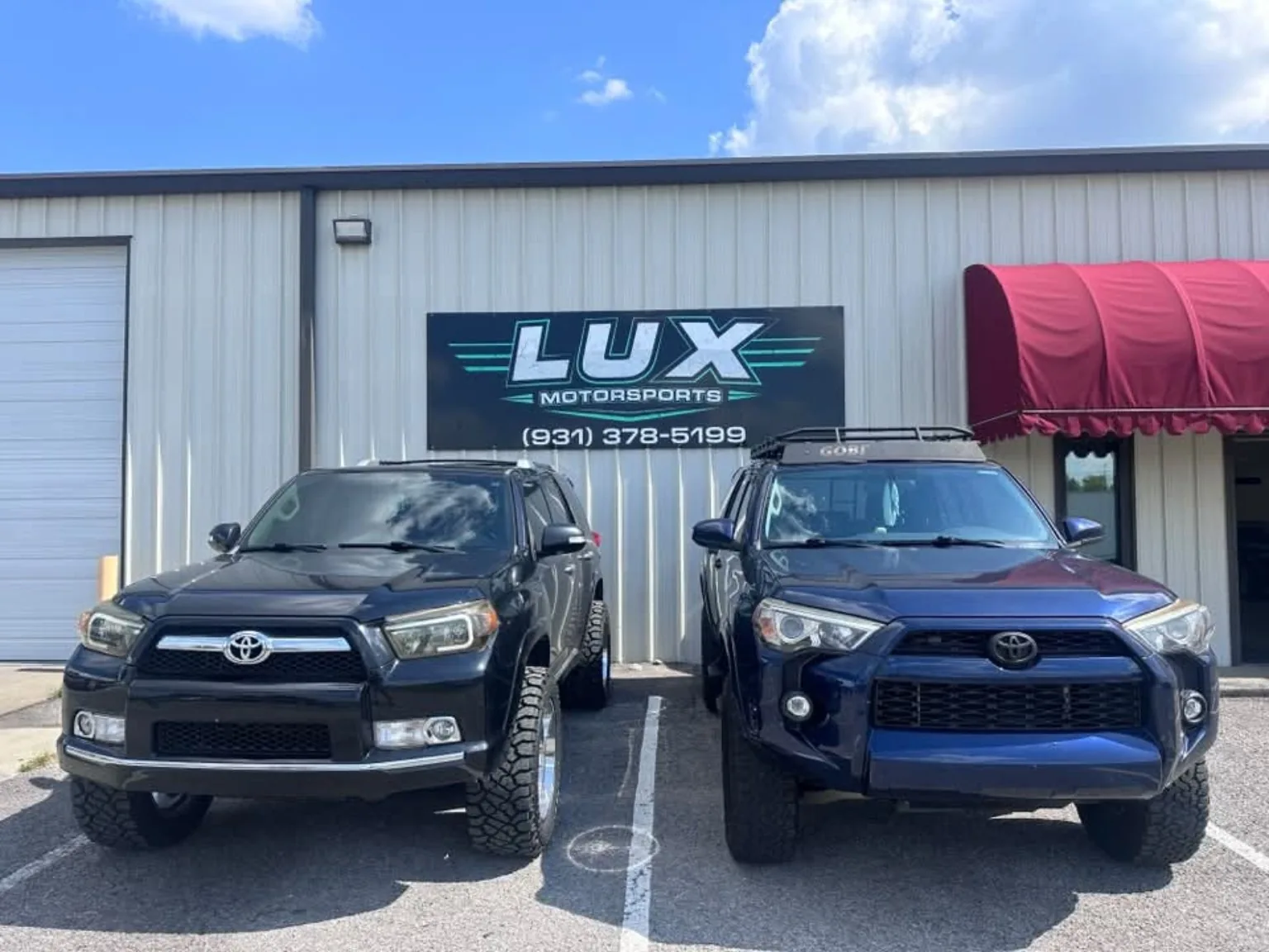 Two Toyota vehicles shown at the shop